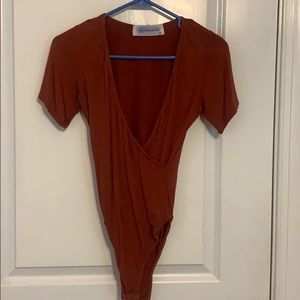 Orange soft body suit